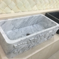 Piastrelle lucide in marmo bianco di Carrara