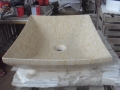 Lavandino del bagno in marmo beige di forma rettangolare