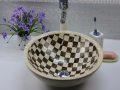Lavabo e lavandino del bagno di forma rotonda mosaico di marmo